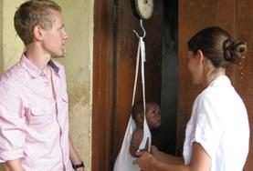 Volunteer Medical Electives A Midwife volunteer interacts with a child on a placement in Ghana