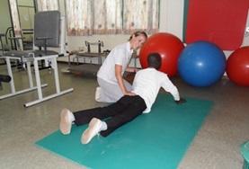 Volunteer Medical Electives A Physiotherapy Elective volunteer works with a child during a session in Ghana