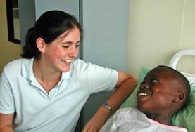 Volunteer Medicine & Healthcare A Dentistry volunteer interacts with a child at her placement in Ghana
