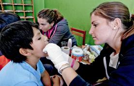 Volunteer Medicine & Healthcare A Medicine volunteer inspects a patient on a placement in Peru