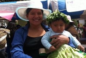 Volunteer Medicine & Healthcare Peruvian locals pose for a picture at a Nutrition Project outreach
