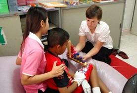 Volunteer Medicine & Healthcare A volunteer interacts with children on an Occupational Therapy placement in Cambodia