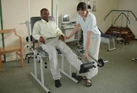 Volunteer Medicine & Healthcare A Physiotherapy Project volunteer works with a patient at a placement in Ghana