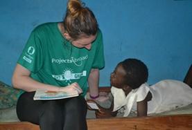 Volunteer Social Work A volunteer and child interact on a Social Work internship in Ghana