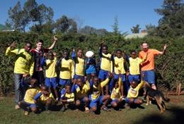Volunteer Sports A sports team pose for a picture at a volunteer placement in Kenya