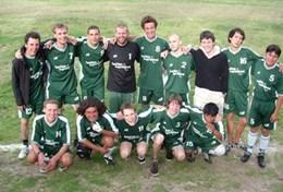 Volunteer Sports A sports team pose for a picture with their Sports coach on a placement in Peru