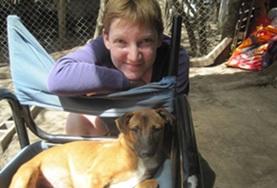 Volunteer Veterinary Medicine & <br /> Animal Care A volunteer pictured with a dog during an Animal Care Veterinary Medicine Project in Argentina
